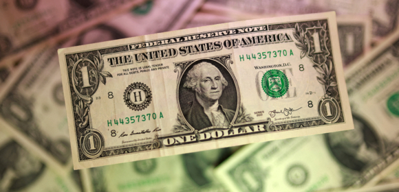 Dólar oscila perto da estabilidade ante o real após dados de inflação